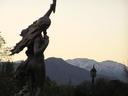 Statue in the park with the Andes in sight.